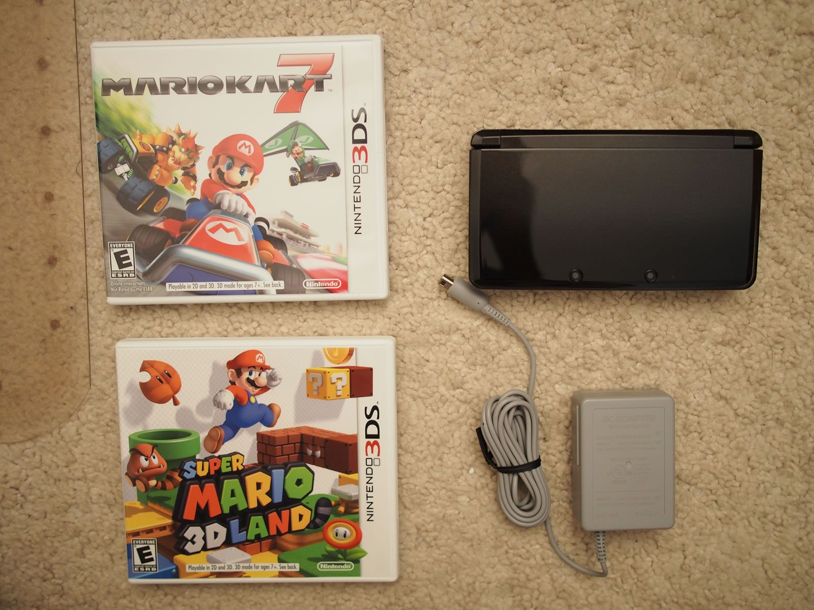 Nintendo 3DS Cosmo Black System (NTSC) + Mario Kart 7 / Super Mario 3D